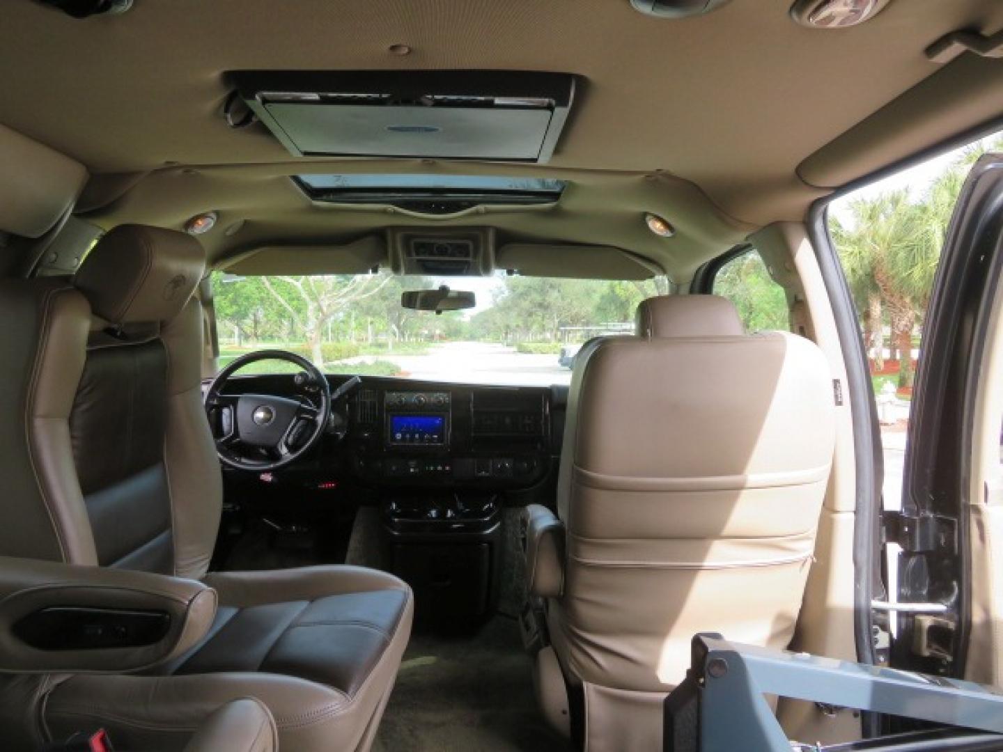 2017 Black /Tan and Brown 2 Tone Chevrolet Express (1GCWGAFG8H1) , located at 4301 Oak Circle #19, Boca Raton, FL, 33431, (954) 561-2499, 26.388861, -80.084038 - You are looking at a Gorgeous 2017 Chevy Express 2500 Explorer Handicap Wheelchair Conversion Van Fully Loaded With: 96K Original Miles, Power Side Entry Doors, VMI Side Entry Wheelchair Lift, 6 Way B and D Transfer Seat, Two Tone Leather Interior, Heated Front Seats, Front Sunroof, Rear Power Foldi - Photo#58